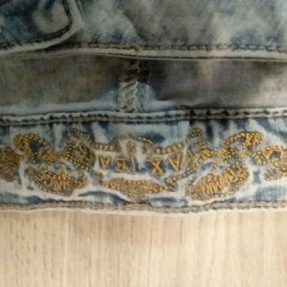 Acid wash jean with side ankle zip and knee detail - Picture 4 of 5